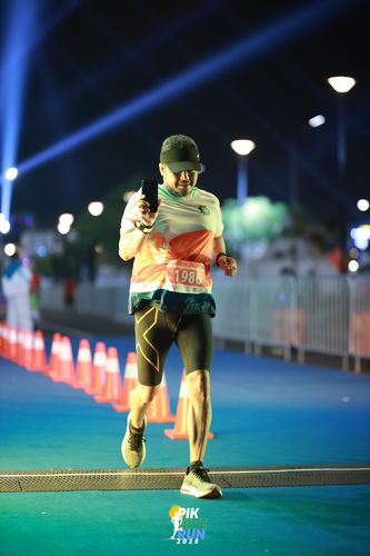 Race photo from PIK NITE RUN 2025