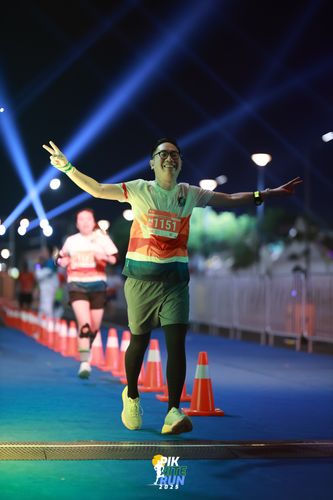 Race photo from PIK NITE RUN 2025