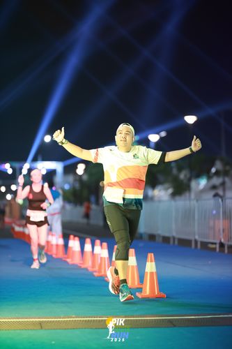 Race photo from PIK NITE RUN 2025