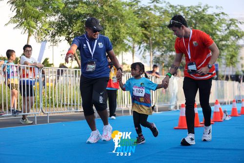 Race photo from PIK NITE RUN 2025