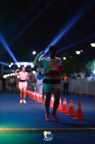 Race photo from PIK NITE RUN 2025