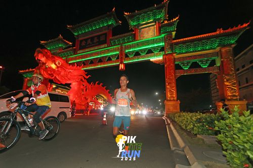 Race photo from PIK NITE RUN 2025