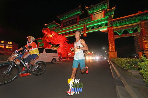 Race photo from PIK NITE RUN 2025