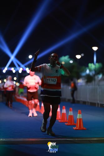 Race photo from PIK NITE RUN 2025