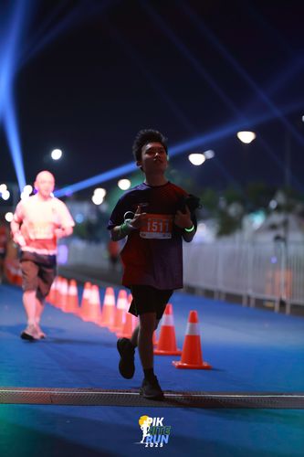 Race photo from PIK NITE RUN 2025