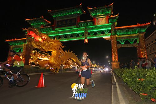 Race photo from PIK NITE RUN 2025