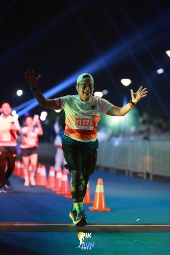 Race photo from PIK NITE RUN 2025