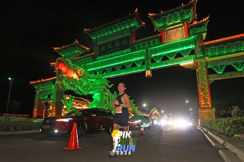 Race photo from PIK NITE RUN 2025