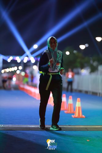 Race photo from PIK NITE RUN 2025