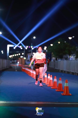 Race photo from PIK NITE RUN 2025