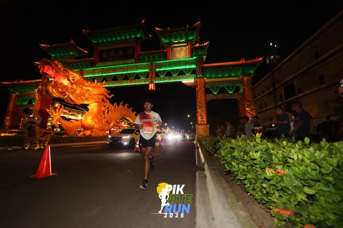 Race photo from PIK NITE RUN 2025