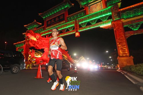 Race photo from PIK NITE RUN 2025