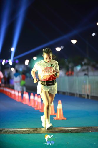 Race photo from PIK NITE RUN 2025