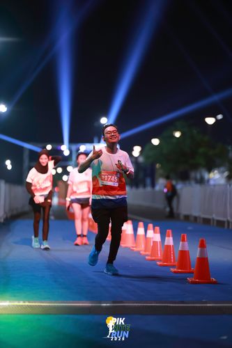 Race photo from PIK NITE RUN 2025