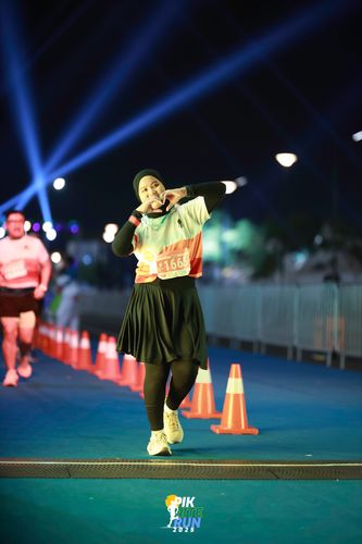 Race photo from PIK NITE RUN 2025