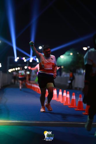 Race photo from PIK NITE RUN 2025