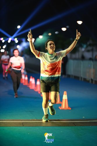 Race photo from PIK NITE RUN 2025