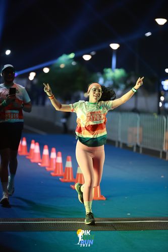 Race photo from PIK NITE RUN 2025