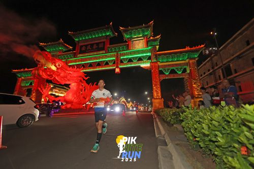 Race photo from PIK NITE RUN 2025