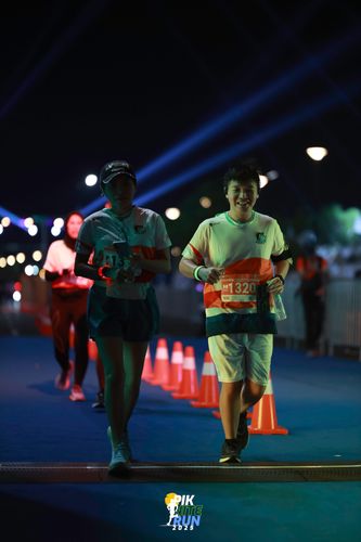 Race photo from PIK NITE RUN 2025