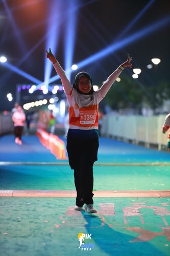 Race photo from PIK NITE RUN 2025
