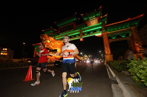 Race photo from PIK NITE RUN 2025