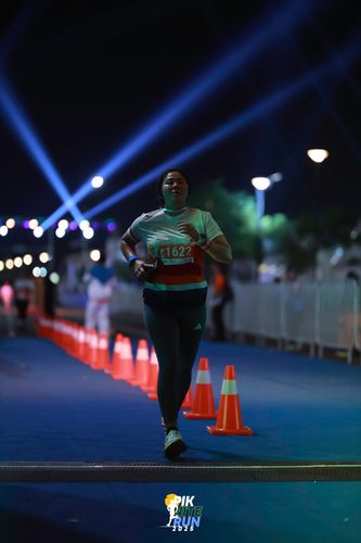 Race photo from PIK NITE RUN 2025