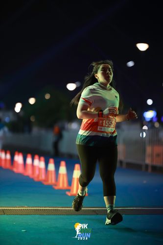 Race photo from PIK NITE RUN 2025