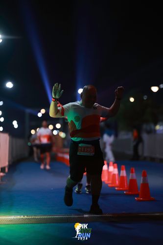 Race photo from PIK NITE RUN 2025