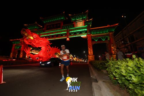 Race photo from PIK NITE RUN 2025