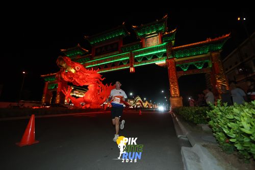 Race photo from PIK NITE RUN 2025