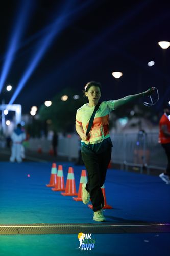 Race photo from PIK NITE RUN 2025