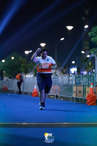 Race photo from PIK NITE RUN 2025