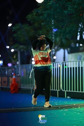 Race photo from PIK NITE RUN 2025
