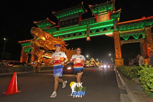 Race photo from PIK NITE RUN 2025