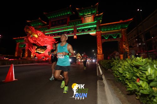 Race photo from PIK NITE RUN 2025