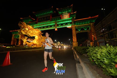 Race photo from PIK NITE RUN 2025