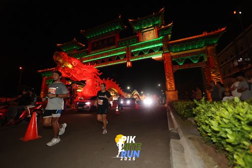 Race photo from PIK NITE RUN 2025