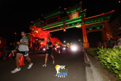 Race photo from PIK NITE RUN 2025