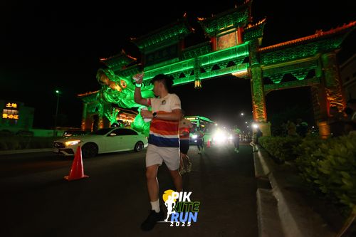 Race photo from PIK NITE RUN 2025