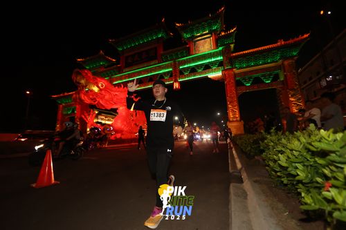 Race photo from PIK NITE RUN 2025
