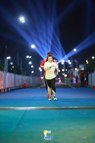 Race photo from PIK NITE RUN 2025