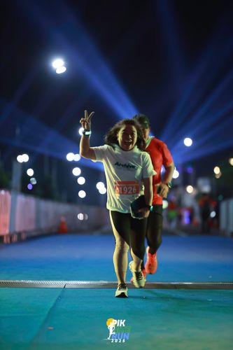 Race photo from PIK NITE RUN 2025