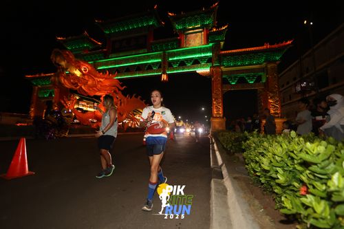 Race photo from PIK NITE RUN 2025