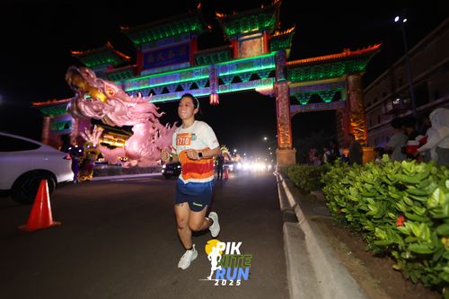 Race photo from PIK NITE RUN 2025