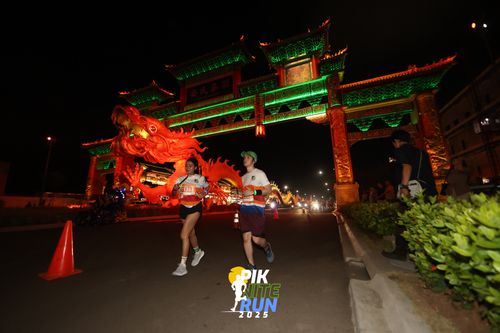 Race photo from PIK NITE RUN 2025