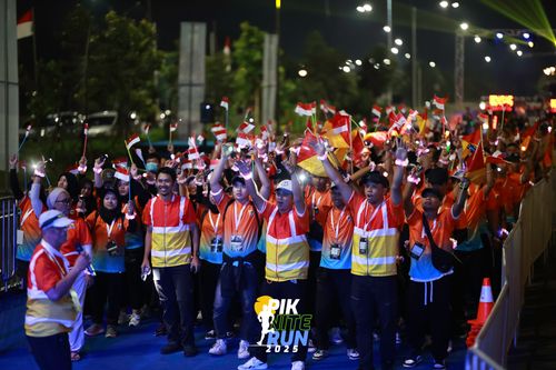 Race photo from PIK NITE RUN 2025