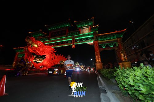 Race photo from PIK NITE RUN 2025