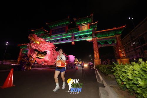 Race photo from PIK NITE RUN 2025