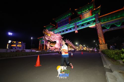 Race photo from PIK NITE RUN 2025